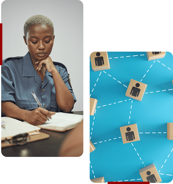 A person thoughtfully writing in a notebook at a desk.